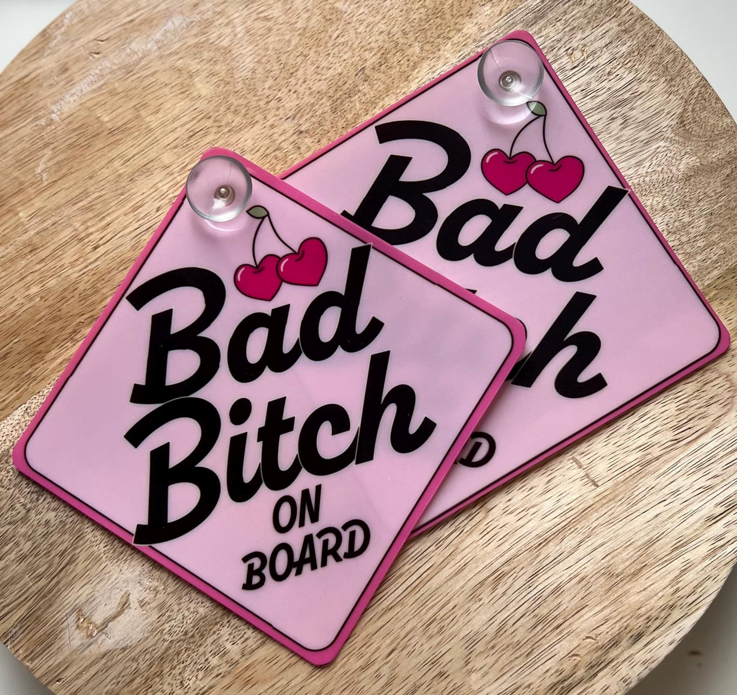 Bad bitch on board sign with suction cup.