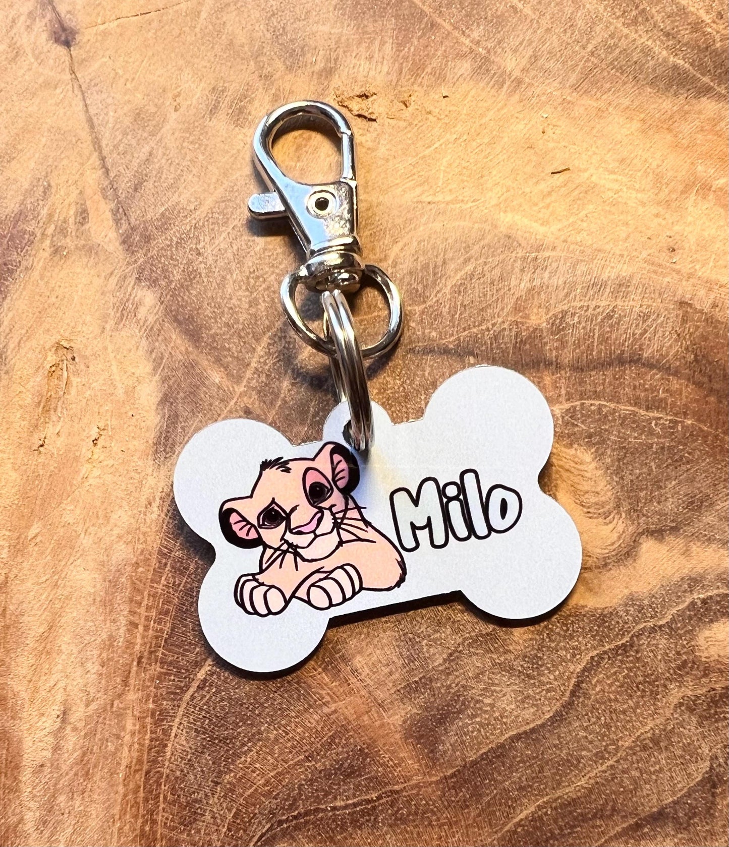 Personalized lion dog tag with name and details