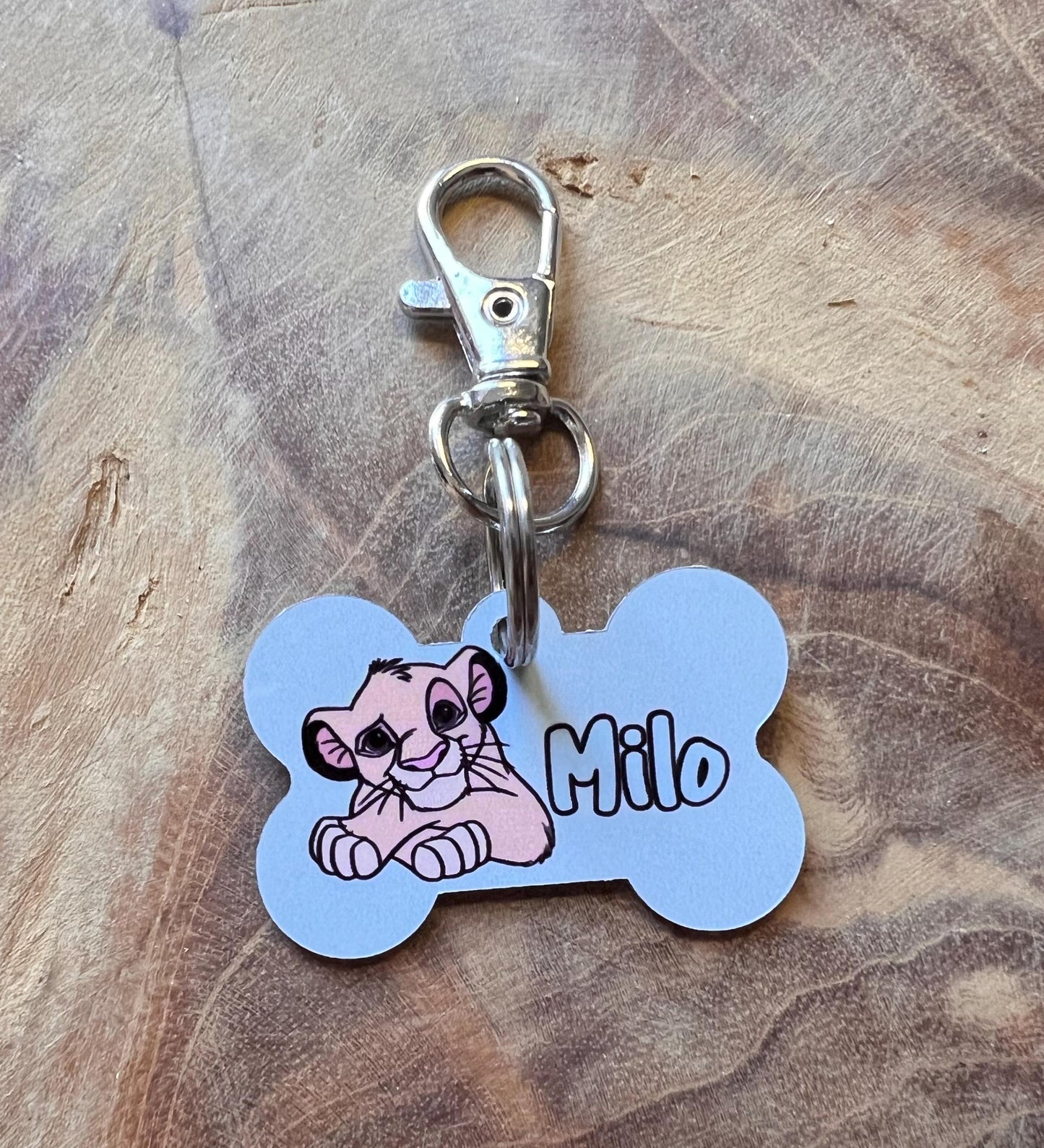 Personalized lion dog tag with name and details