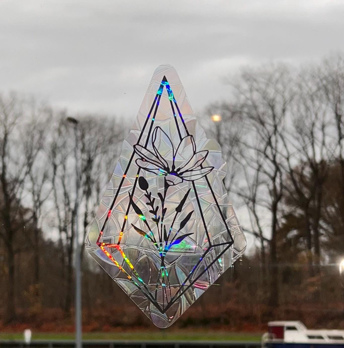 Geometrisch flower suncatcher statisch sticker. Regenboog sticker.